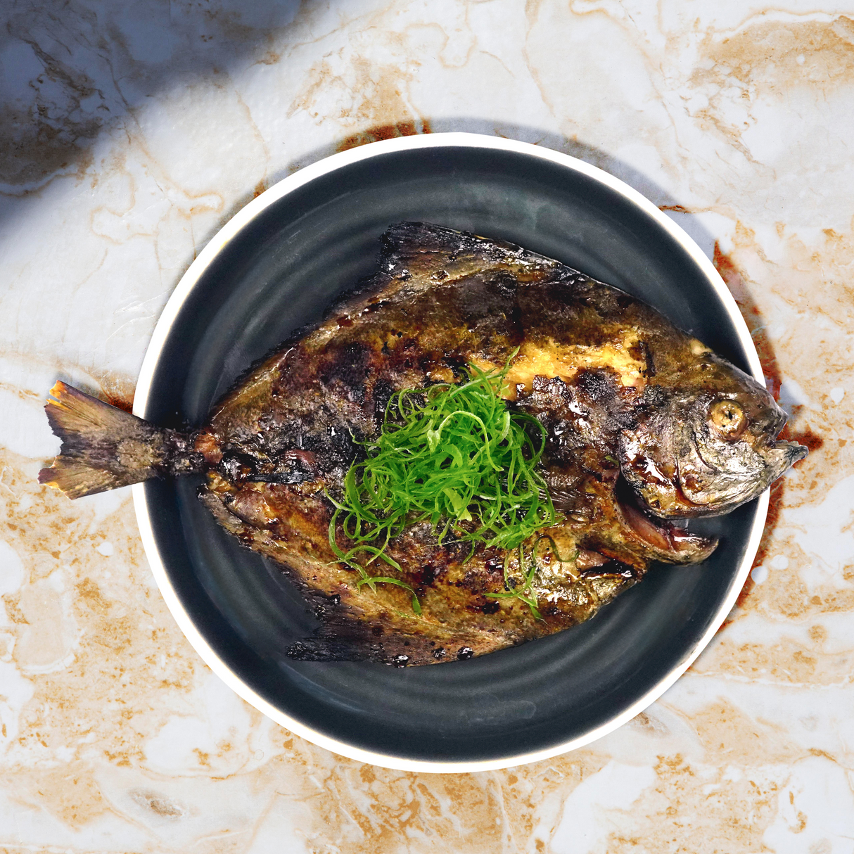 Whole Black Pampano (Pomfret)